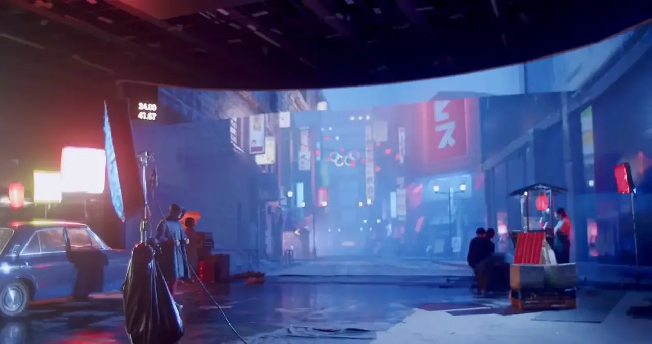 A rebuilt 1960s Tokyo street on the LED volume, with a period car and actors on set