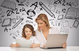 Young girl and woman using tablet and laptop with educational math and science doodles in background.