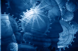 Silhouette of a human head overlaid with interconnected mechanical gears symbolizing mental processes.