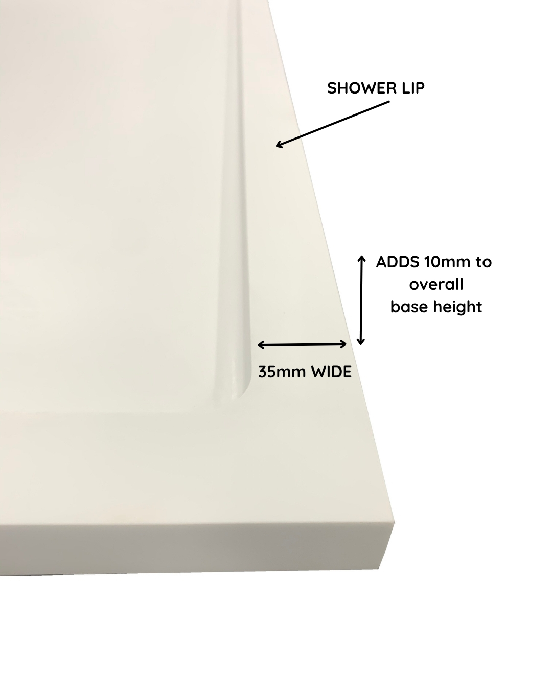 Close-up of a white shower base corner with a raised shower lip measuring 35mm wide and adding 10mm to overall base height.