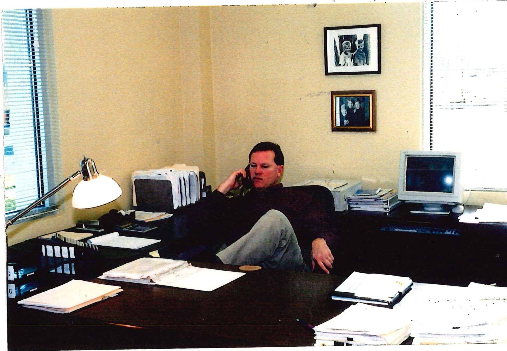 John on the phone in his office around the move to Contract Street