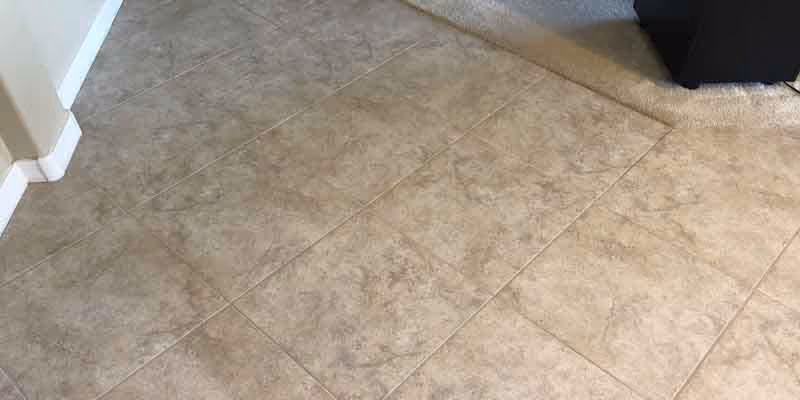 freshly cleaned grout lines with color sealer applied