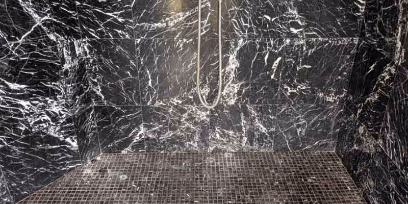 calcium build up on marble shower