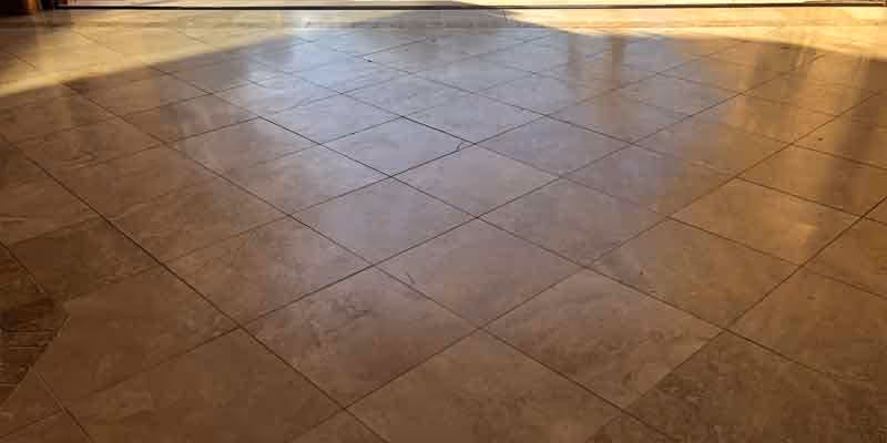 dingy looking travertine tile