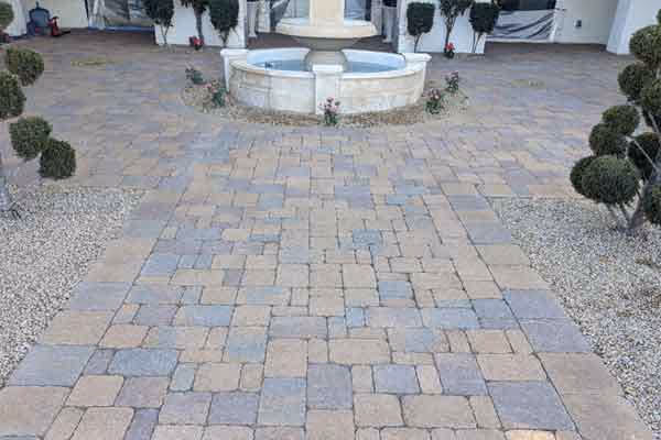 dirty brick paver courtyard