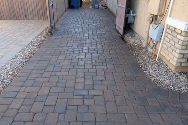 Side house pavers that have been sealed with a wet look