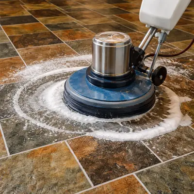 Spraying eco friendly cleaner on tile and grout