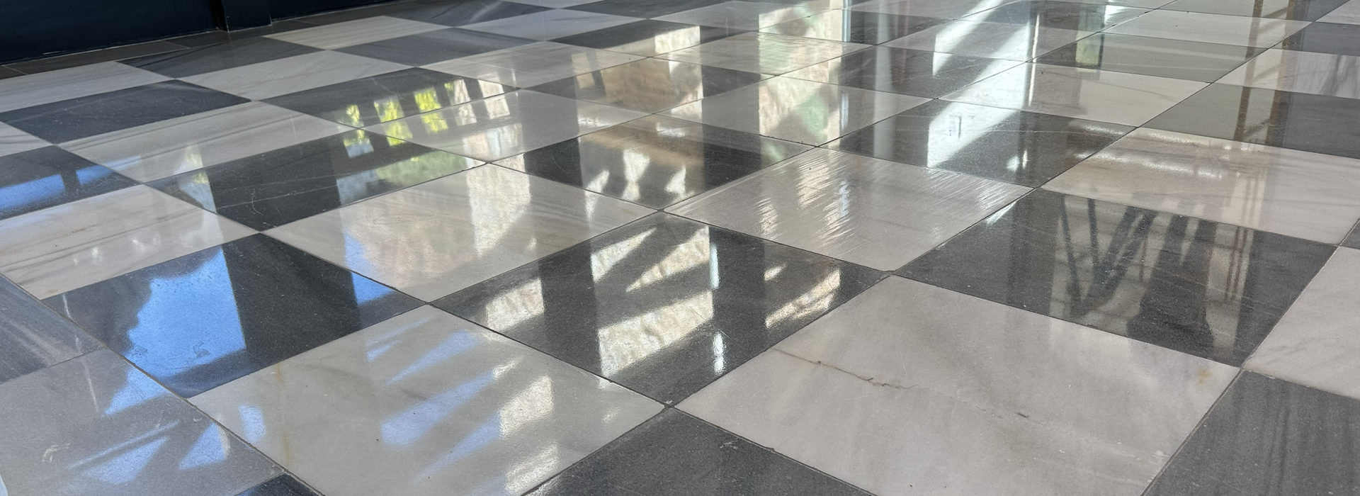 Restored black-and-white checkerboard marble floor at a Paradise Valley, Arizona home