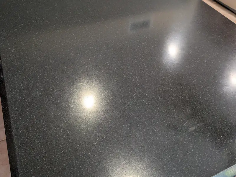 Granite countertop surface photographed during Scottsdale cleaning and sealing project