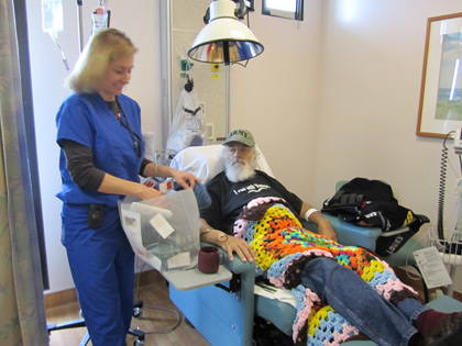 Veteran recieving a Knots of Love chemo cap