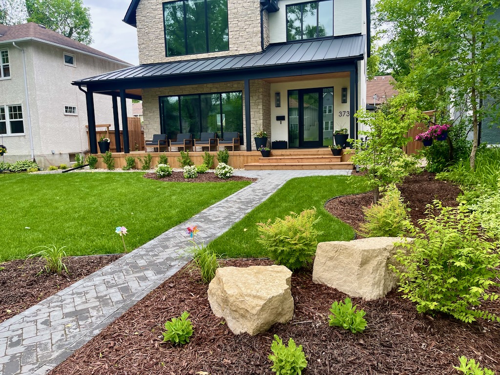 river-heights-front-yard-holland-paving-stone-path-walkway-boulders-winnipeg-landscaping