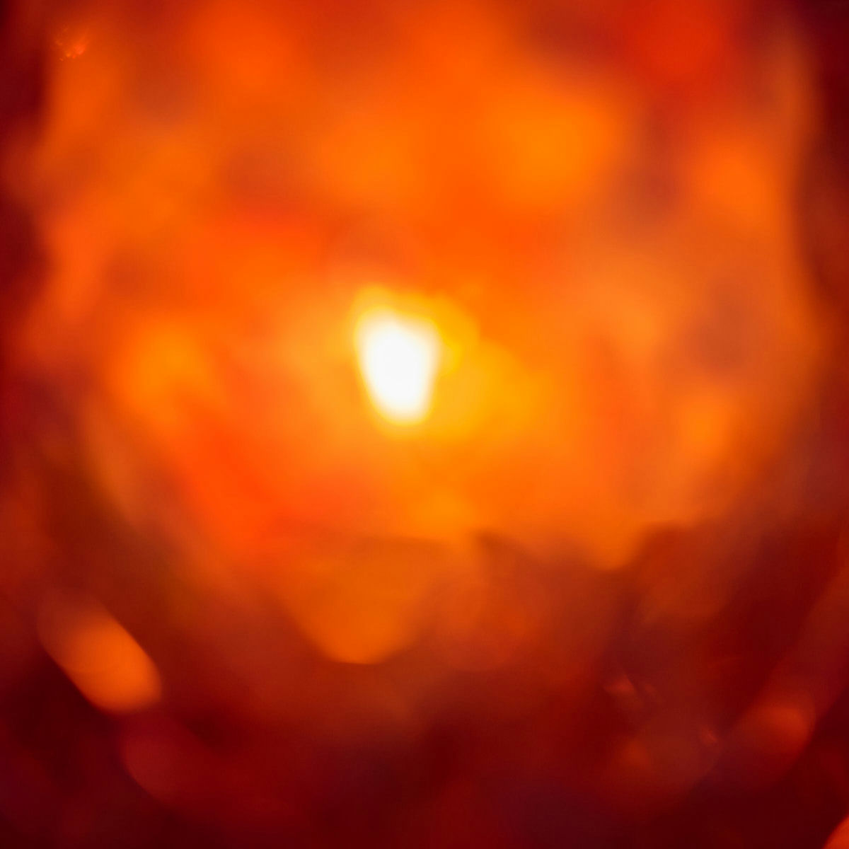 White-hot fire core in the middle of a blurred, red fireball