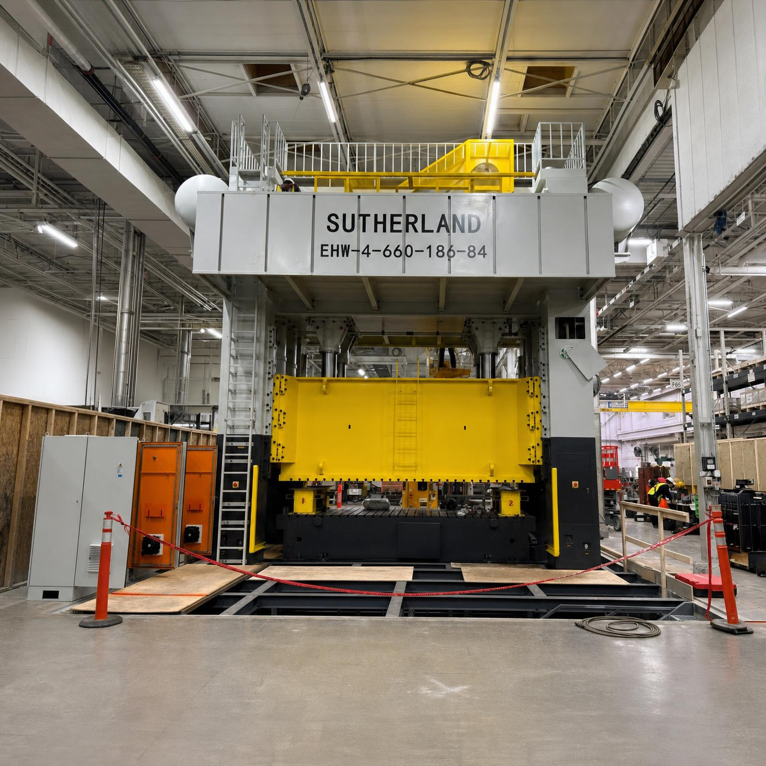 Sutherland EHW-4-660-186-84 four-point 660-ton eccentric heavy wide bed mechanical stamping press on the install floor