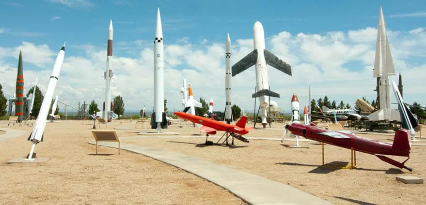 The outdoor missile and rocket display at White Sands Missile Range Museum shines bright on a sunny afternoon.