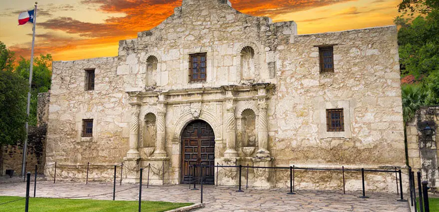 The exterior of the historic Alamo glows shortly after sunrise.