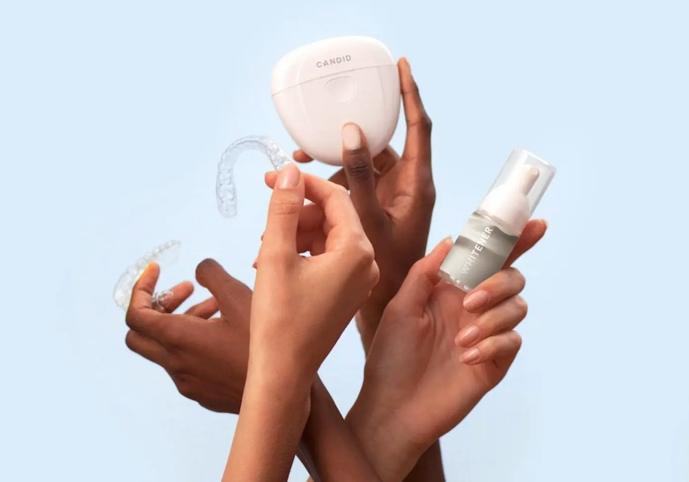 hands holding mouthguards