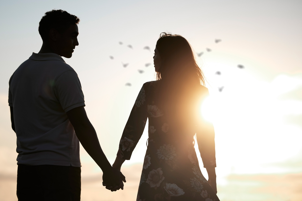 couple holding hands