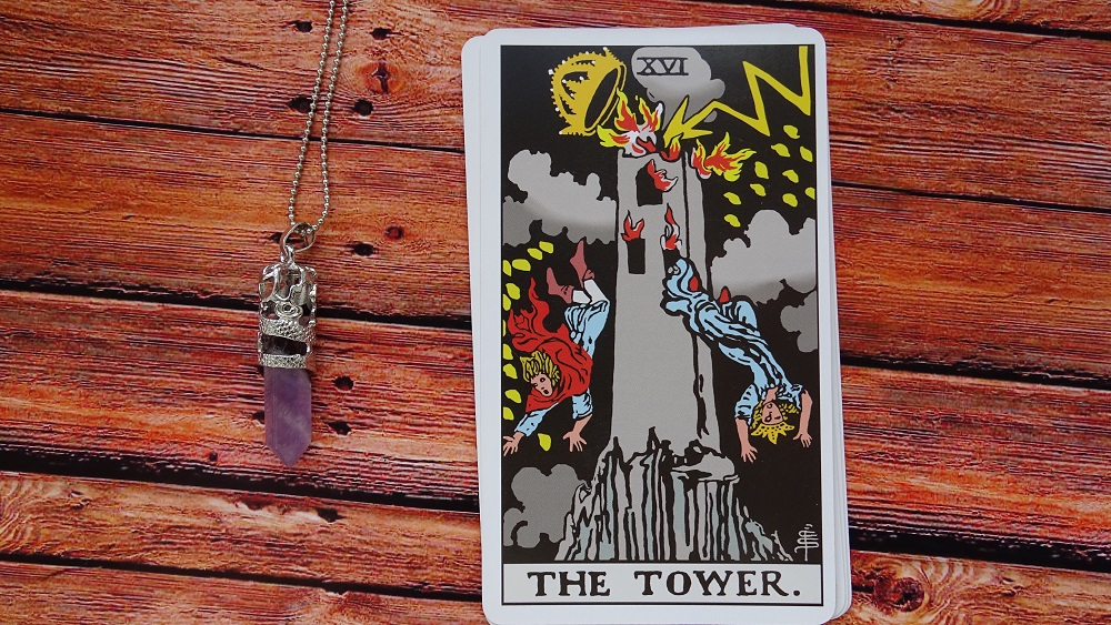 tower tarot card and crystal