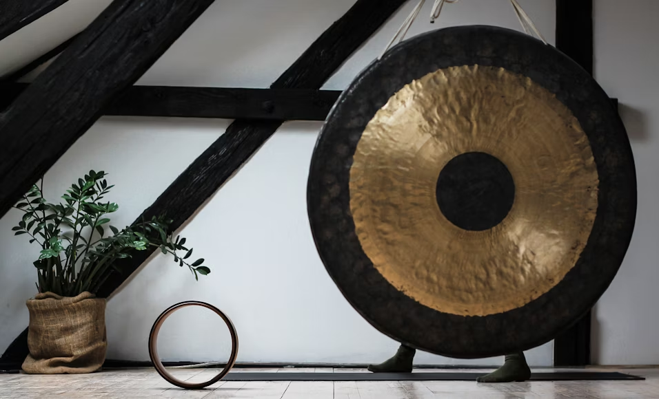 A black and bronze gong.