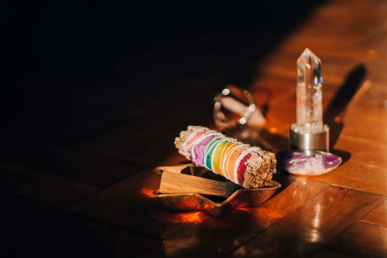 a witchy altar with chakra-inspired elements
