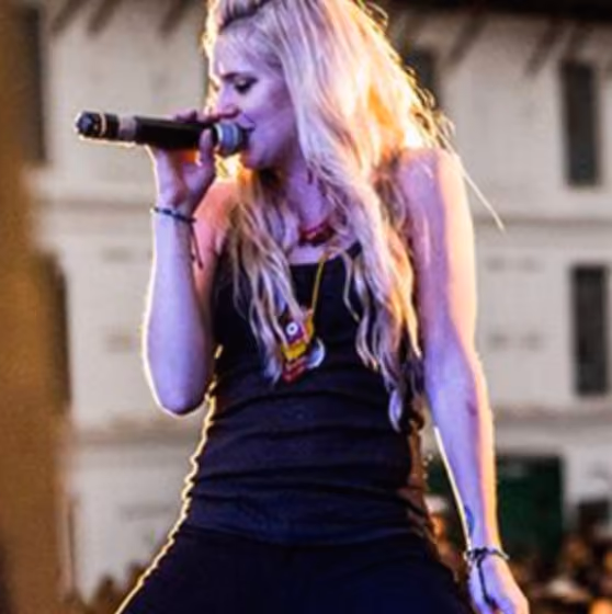 female rapper Kellee Maize performs at a concert in Nepal