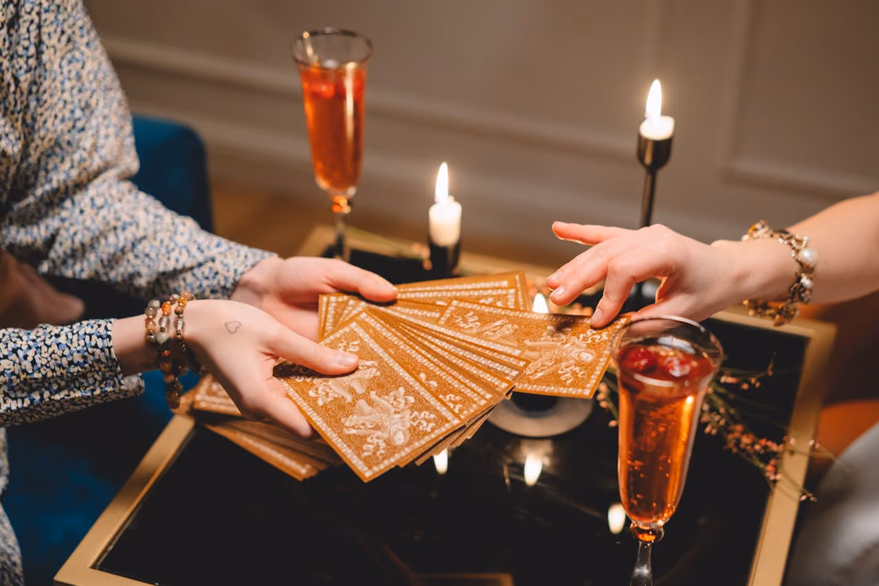 Tarot reader asks client to pull a card during a reading