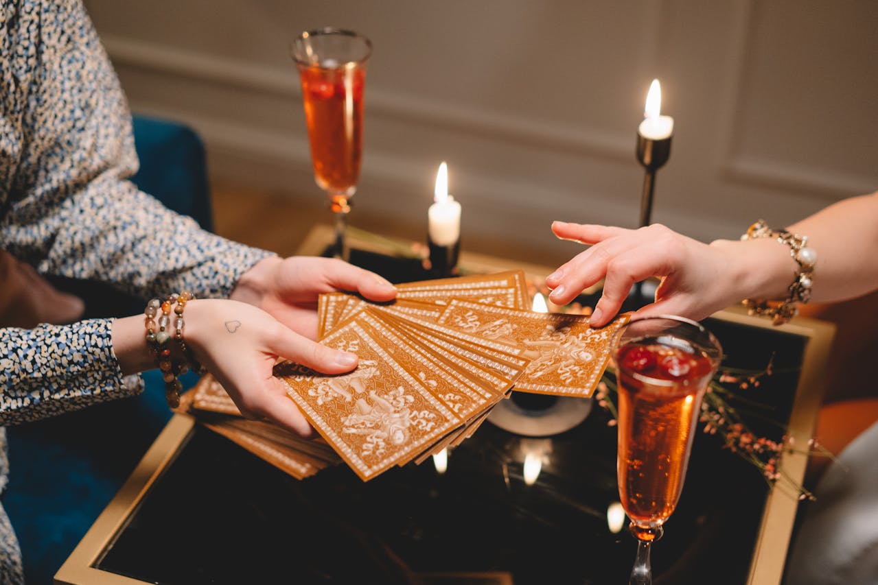 Tarot reader asks client to pull a card during a reading