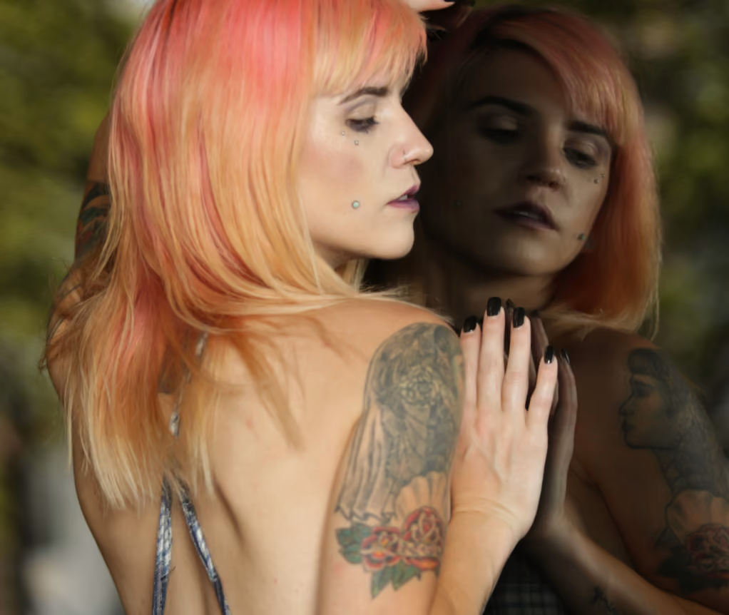 woman with a tattoo on her upper arm from a talented female tattoo artist in Pittsburgh
