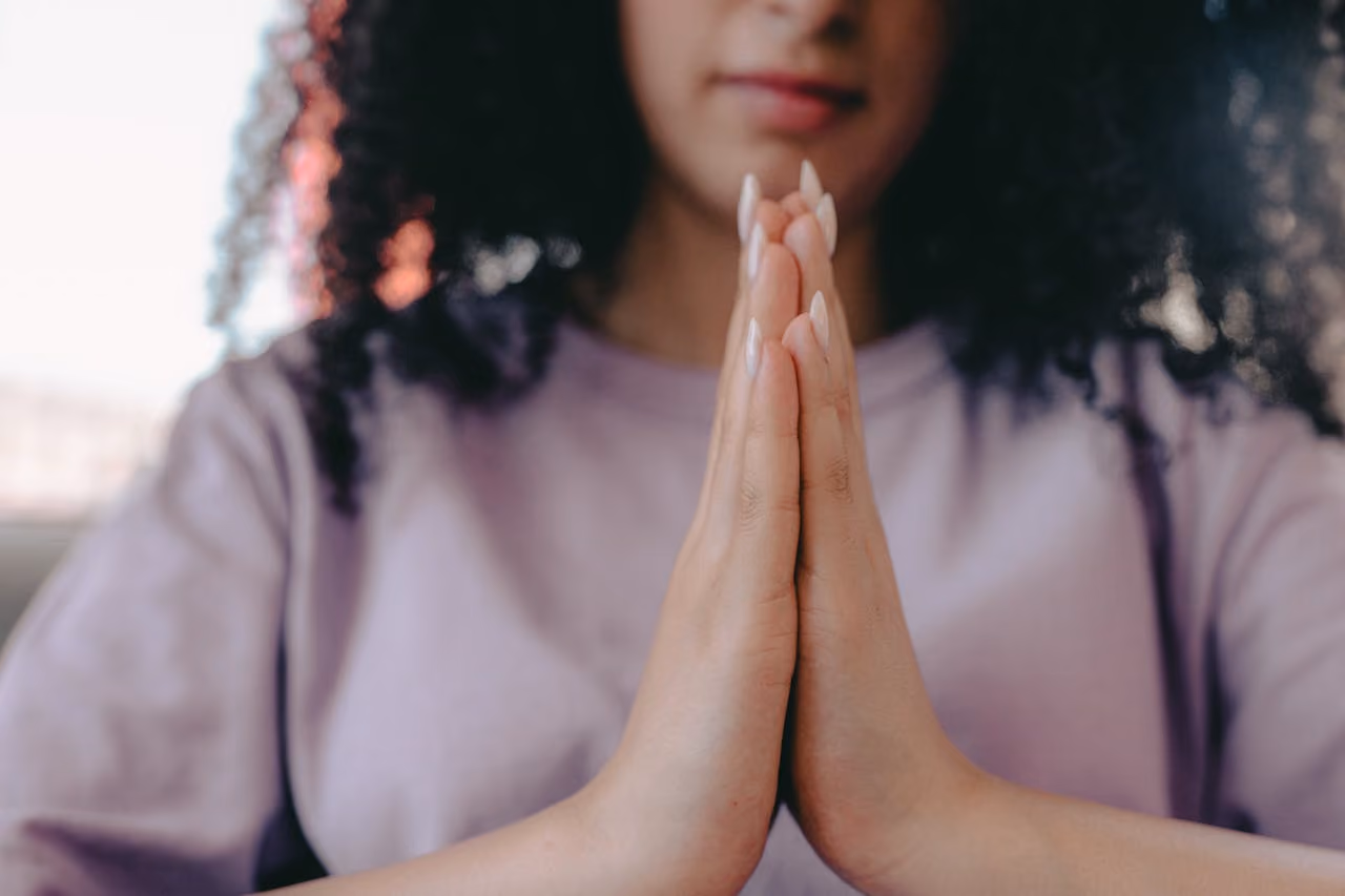 creative woman practicing Reiki energy healing at home