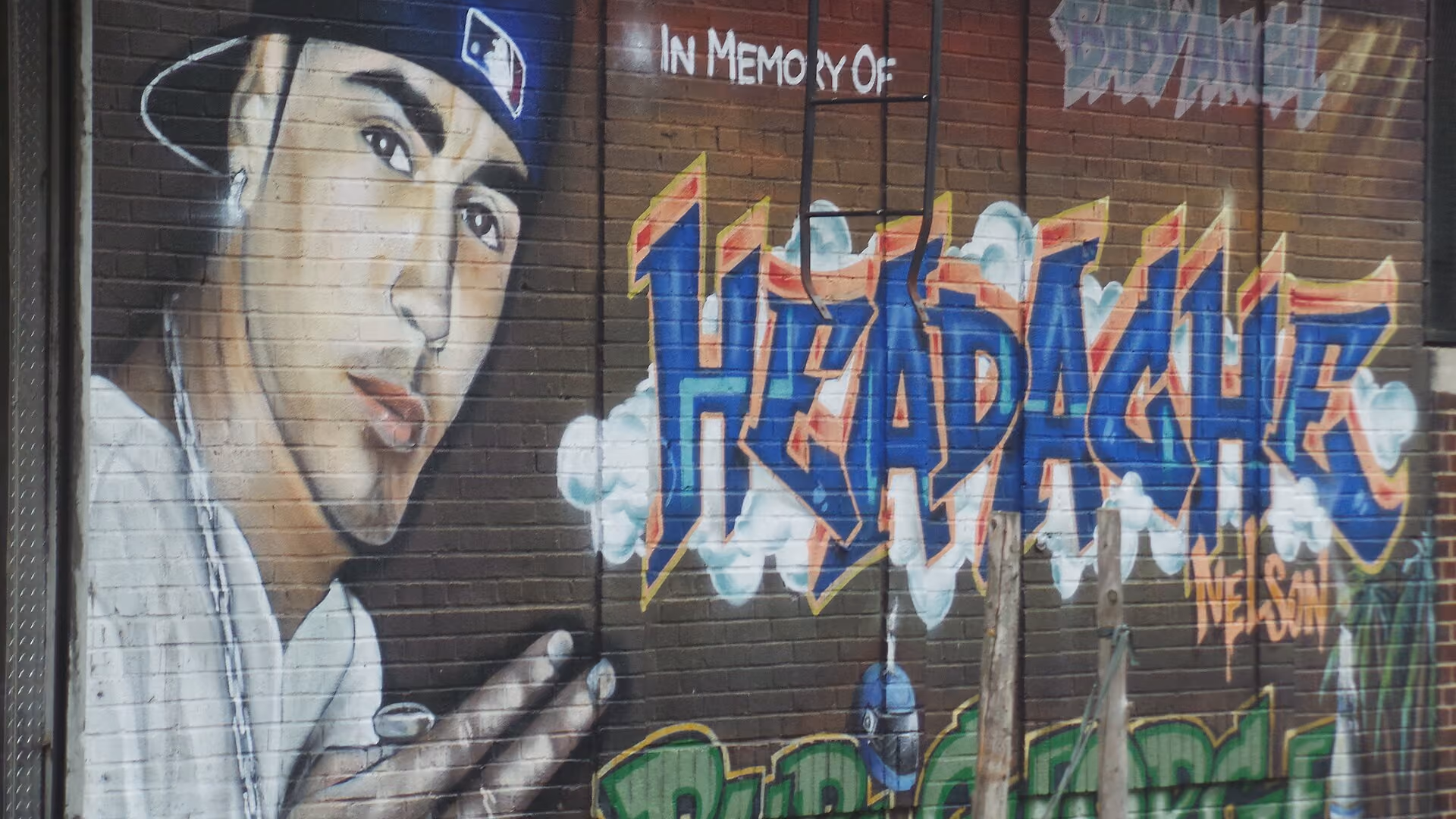 Memorial mural in the Bronx exemplifying graffiti aesthetics in rap visual culture