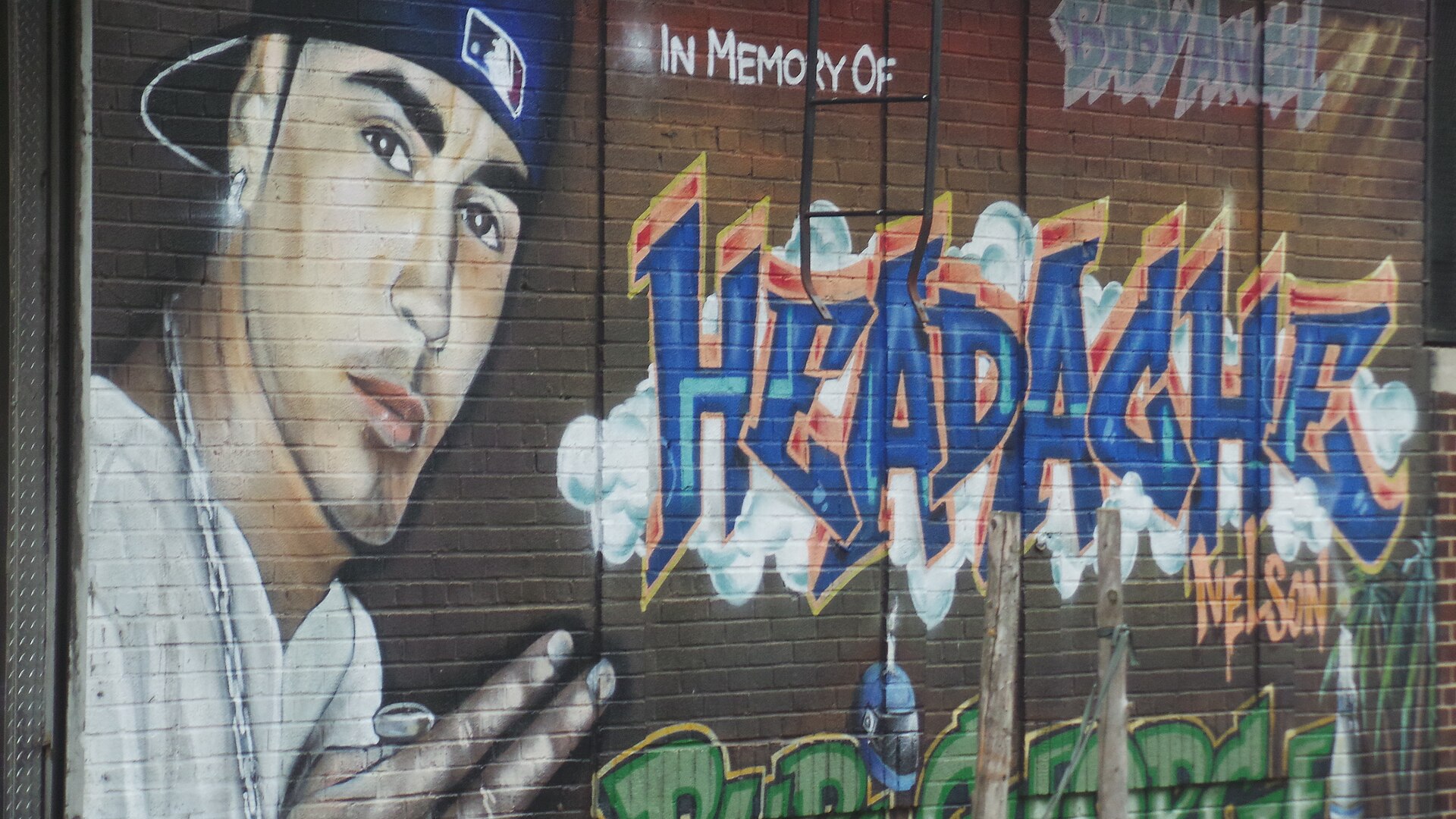 Memorial mural in the Bronx exemplifying graffiti aesthetics in rap visual culture