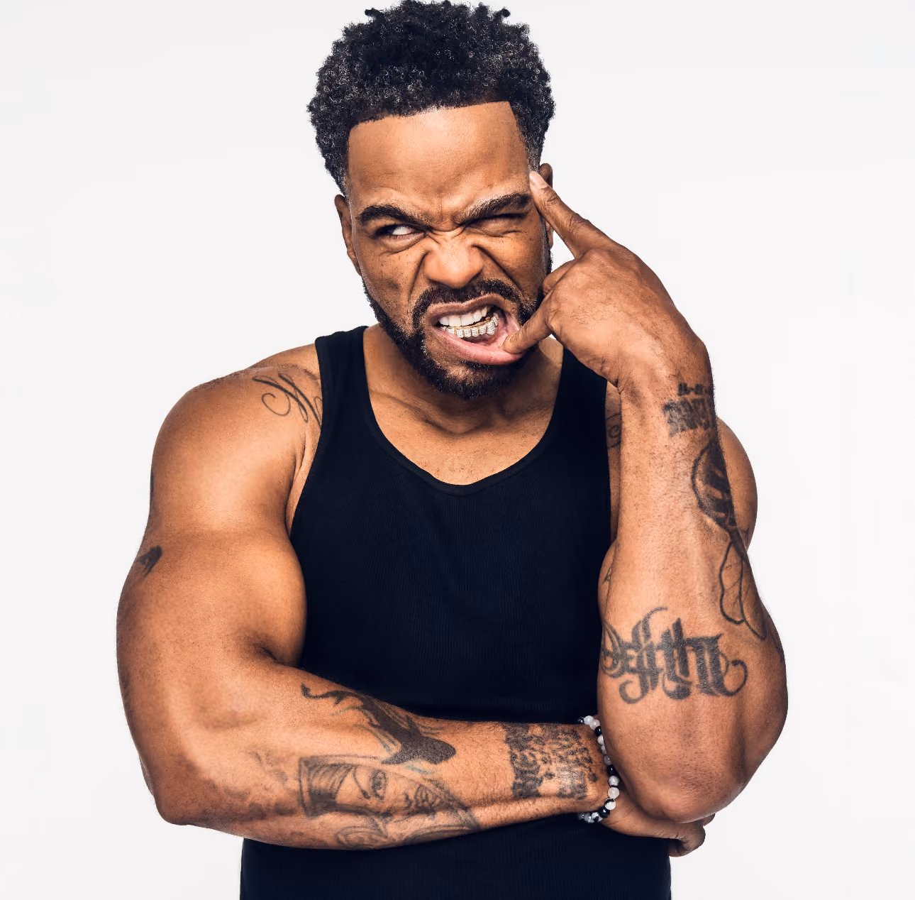 Method Man showing off his tattoos in a photo shoot for Men's Health magazine