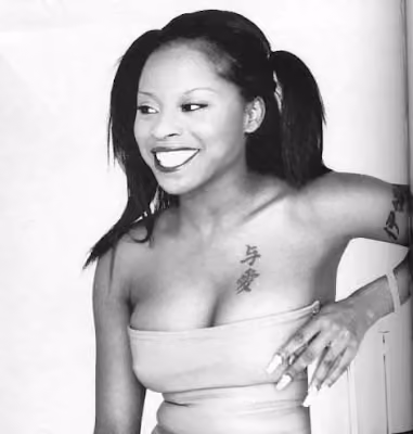 Foxy brown's minimalist tattoos which were common of womens 90s era rap tattoos