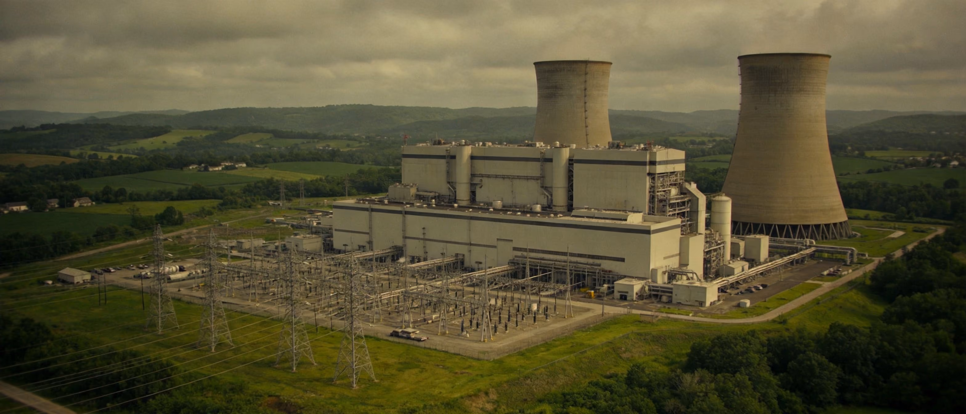 Aerial view of a large data center facility with cooling towers — representing the environmental footprint of data center development proposed for western Pennsylvania.