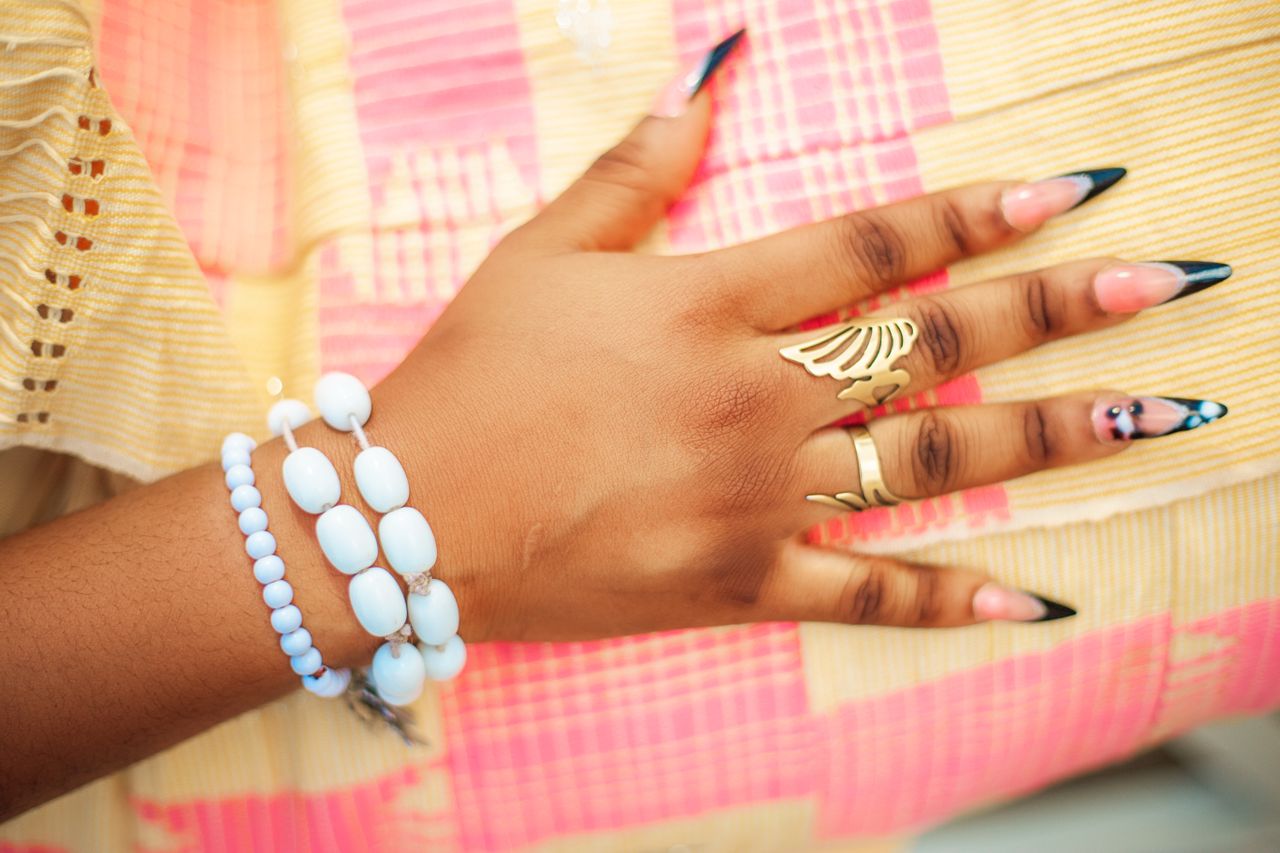 woman wearing opalite jewelry as a part of her third eye work during a transition period in life