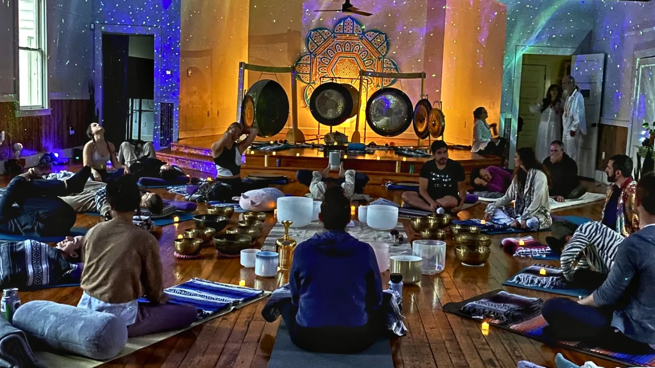 people attending a sound bath and reiki session