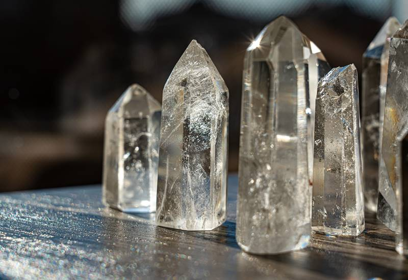 clear quartz pillars on a table