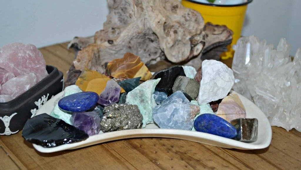 tumbled crystals and stones on a tray