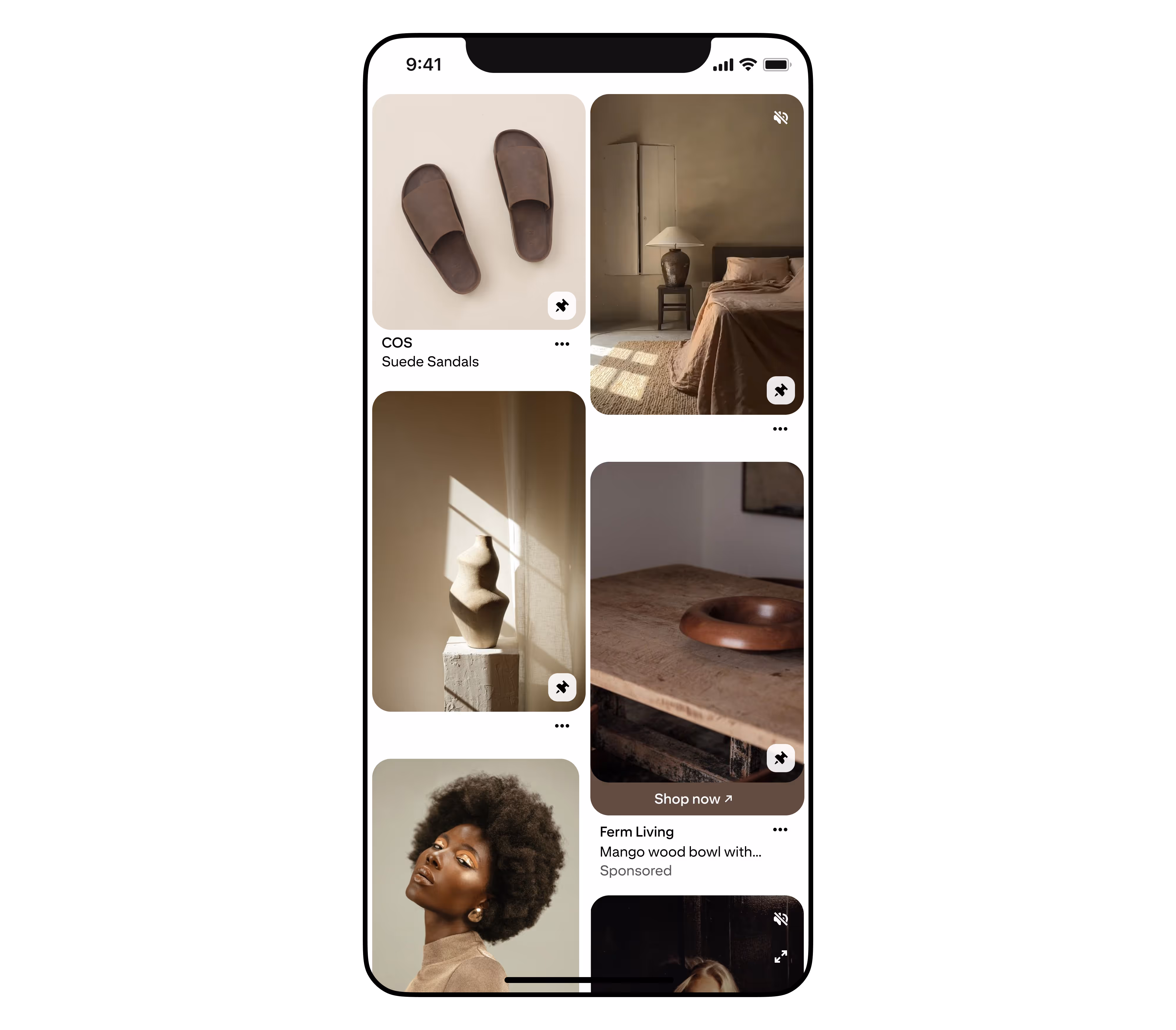 Mobile screen showing a shopping app with images of suede sandals, a bedroom, a sculpture, a wooden bowl, and a woman with an afro hairstyle.