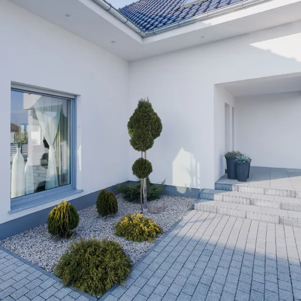 Freshly cleaned home's exterior showing structural integrity, preventing damage to other surfaces, with locally owned washing services focused on core values.