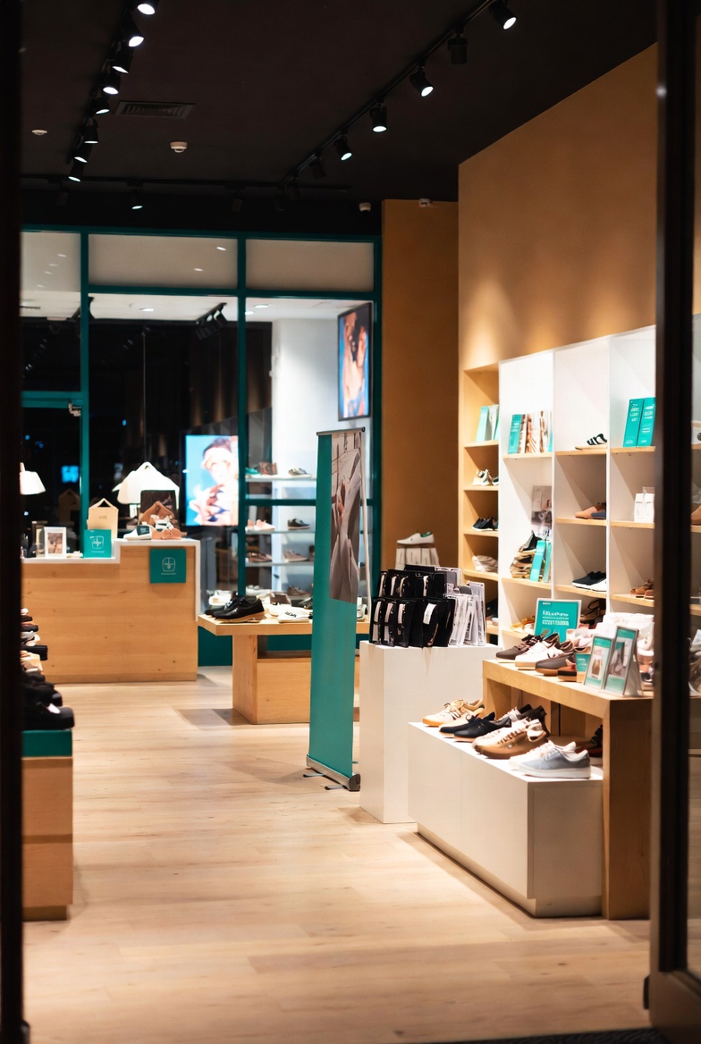 Specialty retail store interior with branded signage and product displays