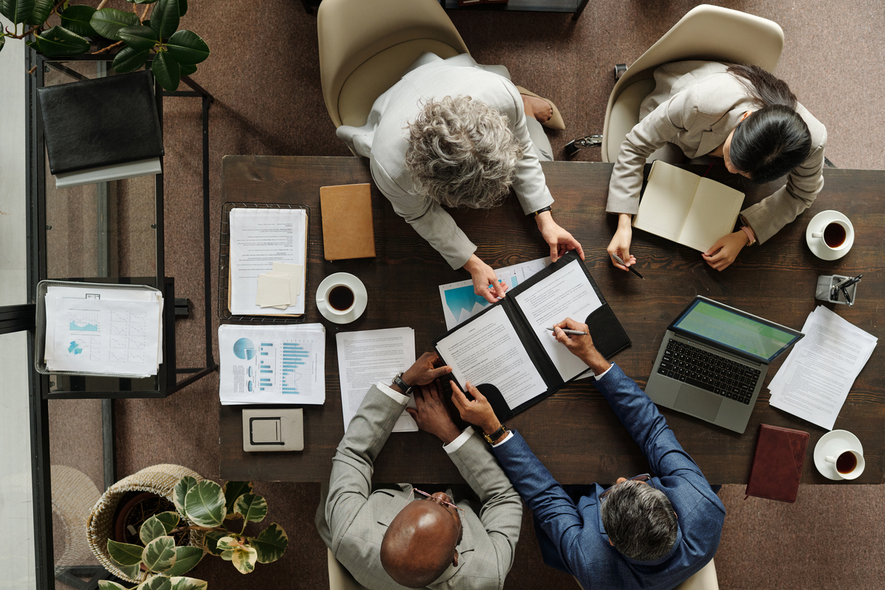 Corporate branded marketing materials on a conference table