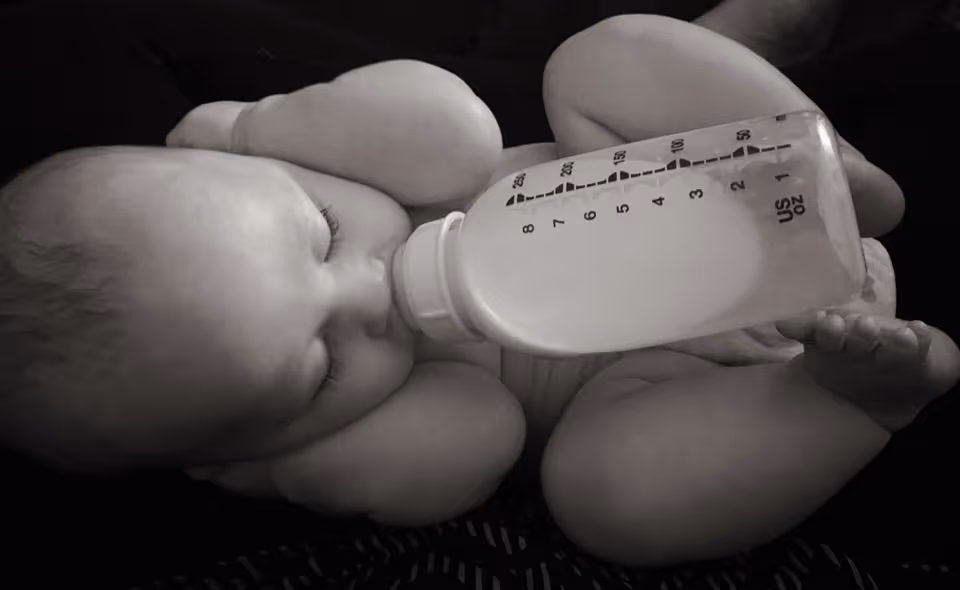 baby drinking bottle