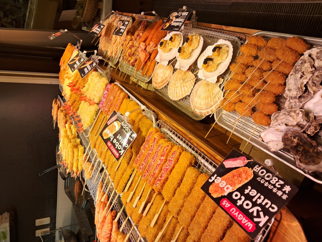 An assortment of food items beautifully arranged, featuring vibrant fruits, vegetables, and gourmet dishes.