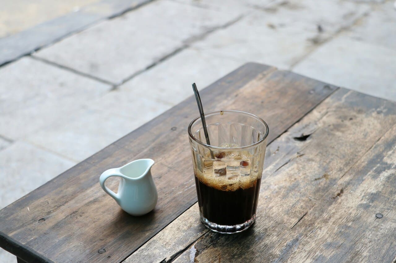 Traditional Vietnamese iced coffee served with condensed milk at a local café.