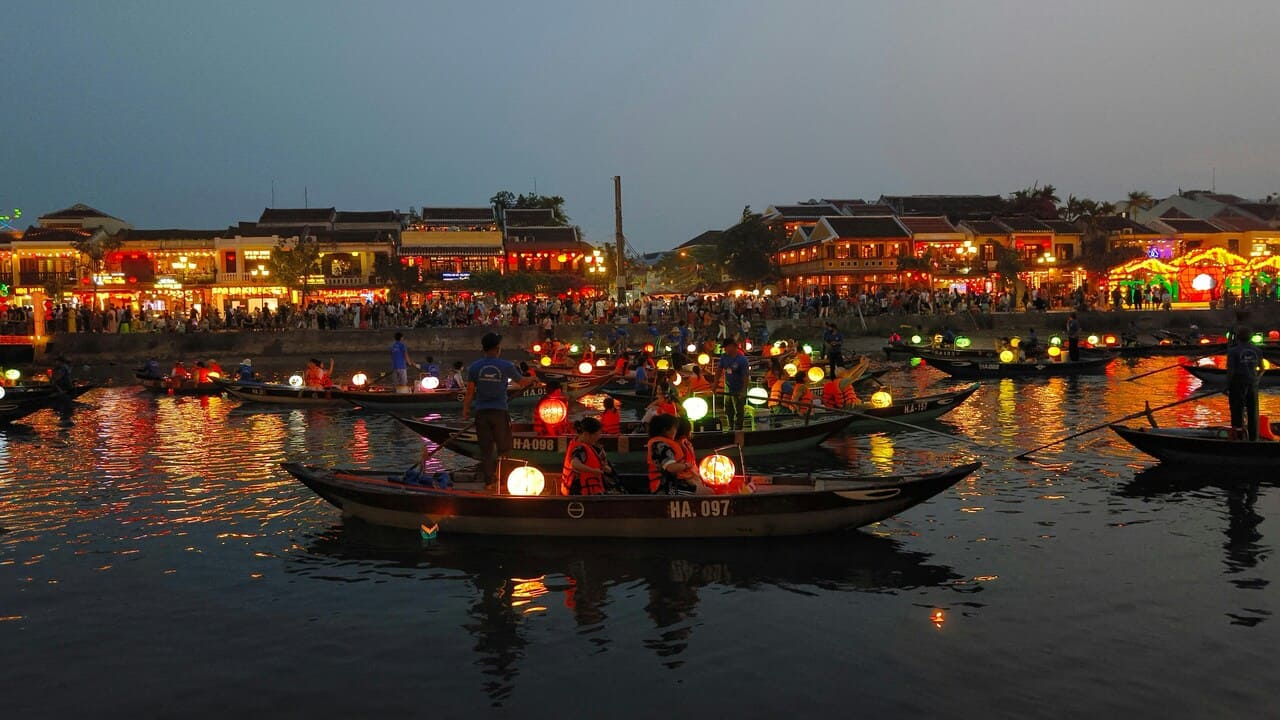 Lantern boat ride on the Thu Bon River in Hoi An at night