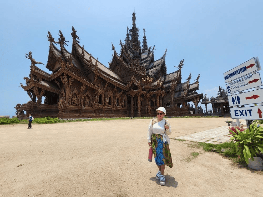 Solo female traveler at the Sanctuary of Truth in Pattaya, Thailand 