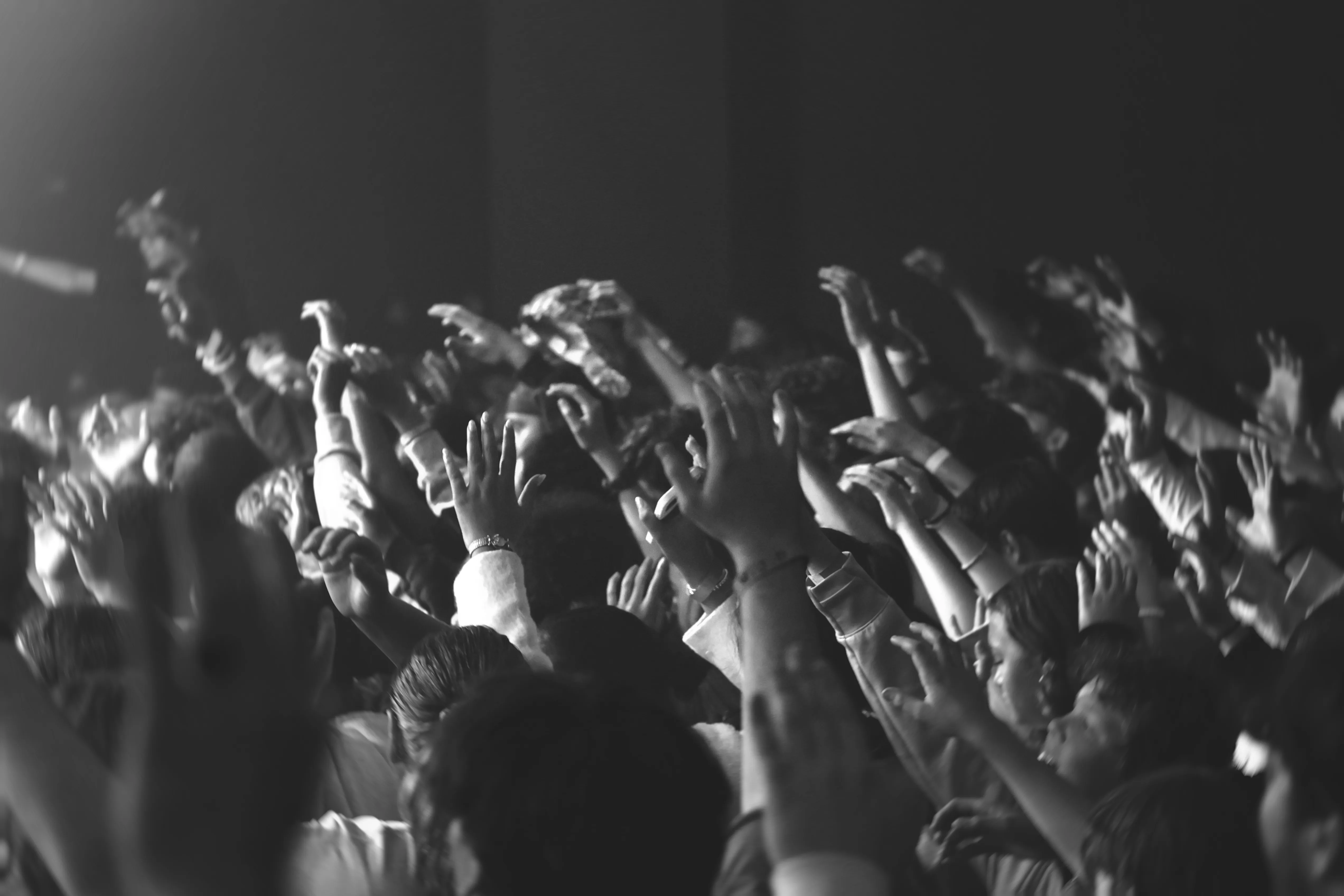A crowd of students worshiping at CrossWalk Youth Conference 2025.