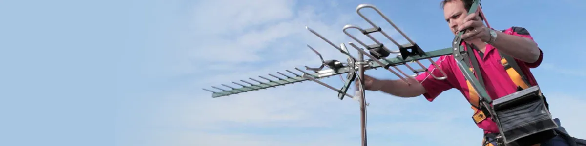 Aerial engineer fixing Antennas