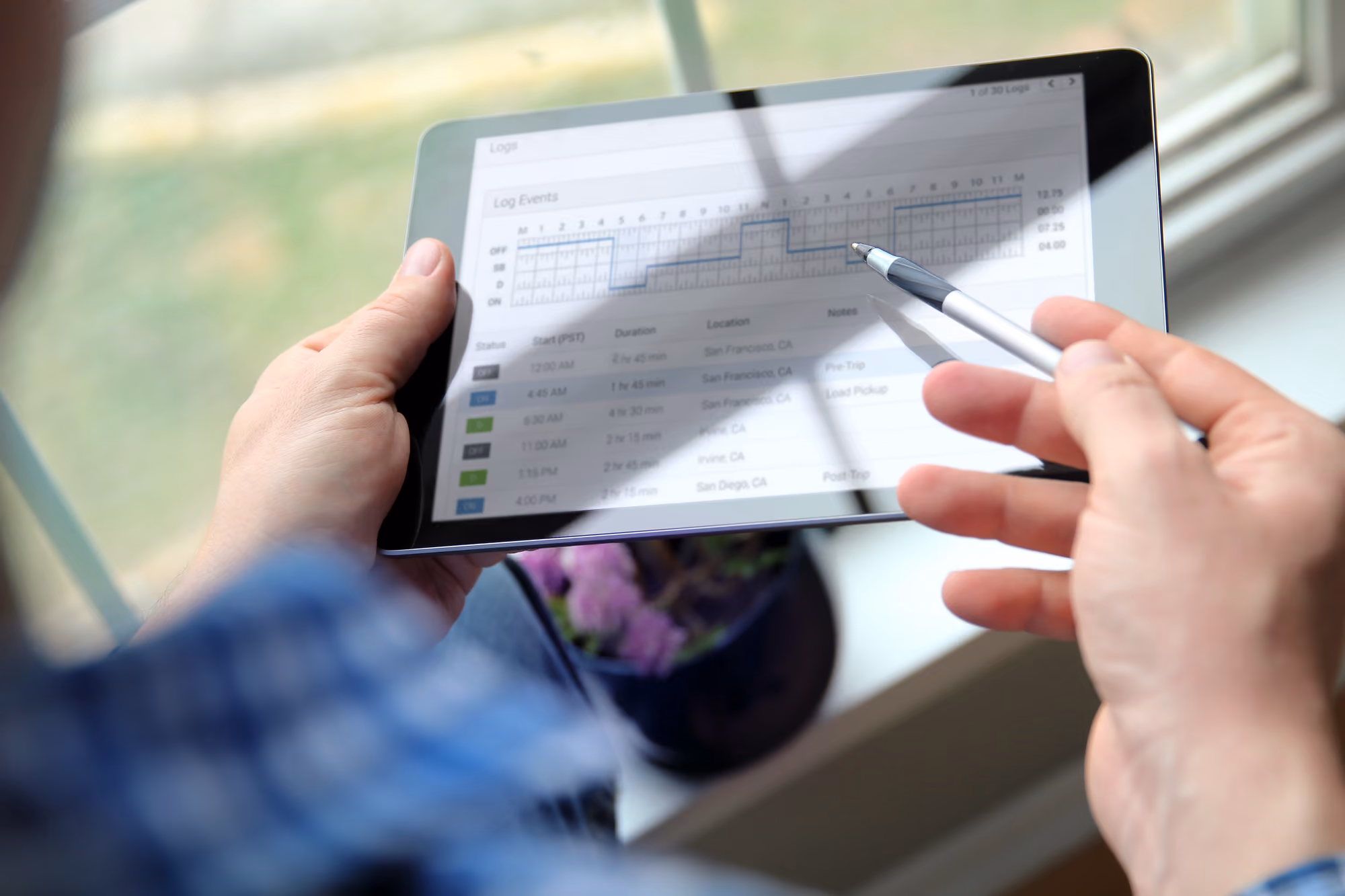 A man holding a tablet